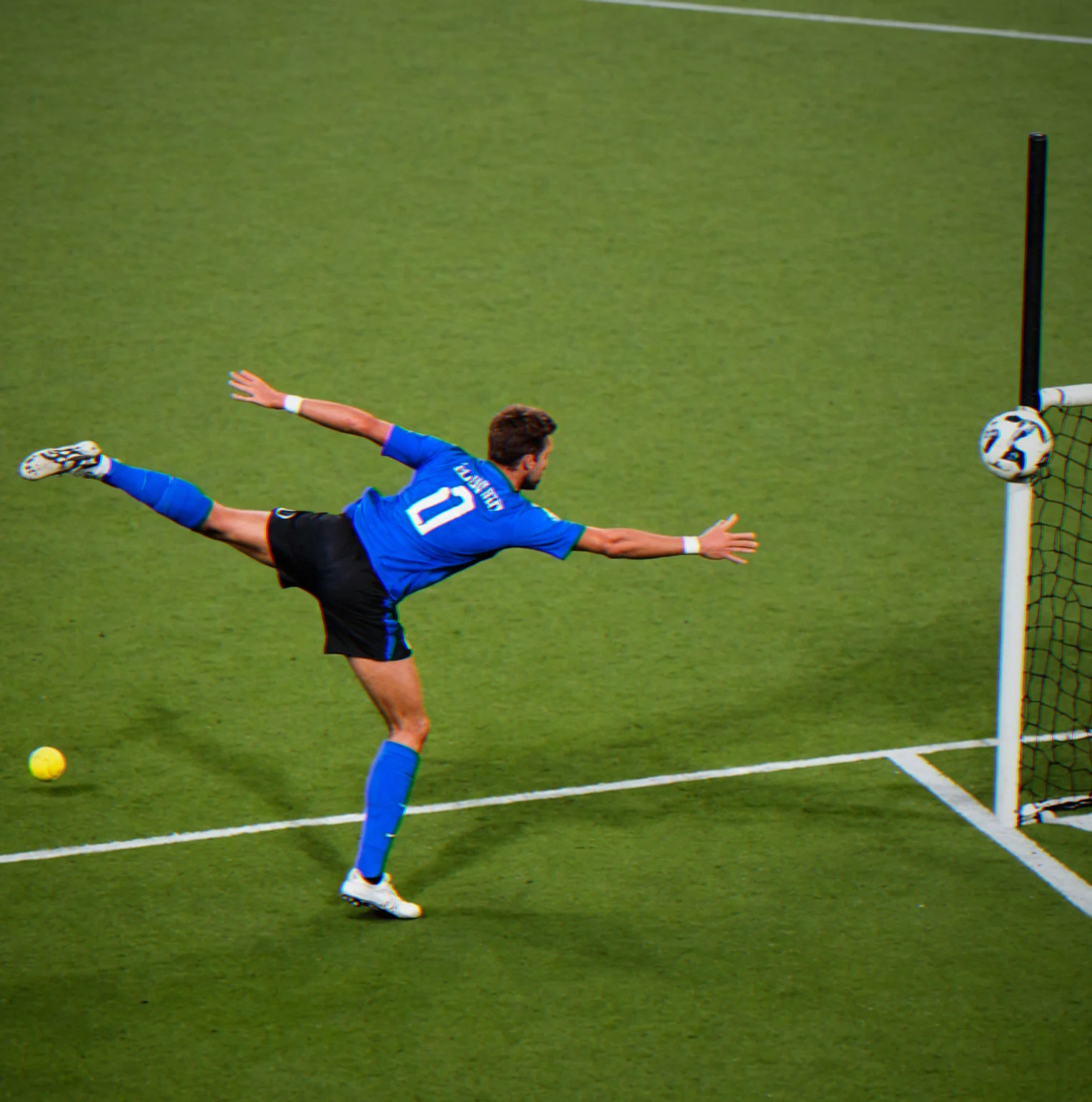 Keeper diving to block a corner kick